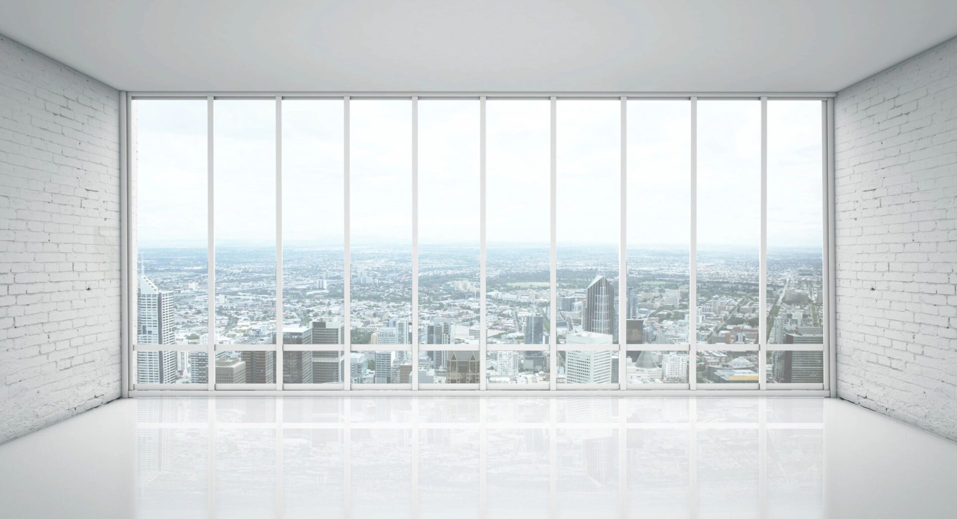 A large window with a view of the city.